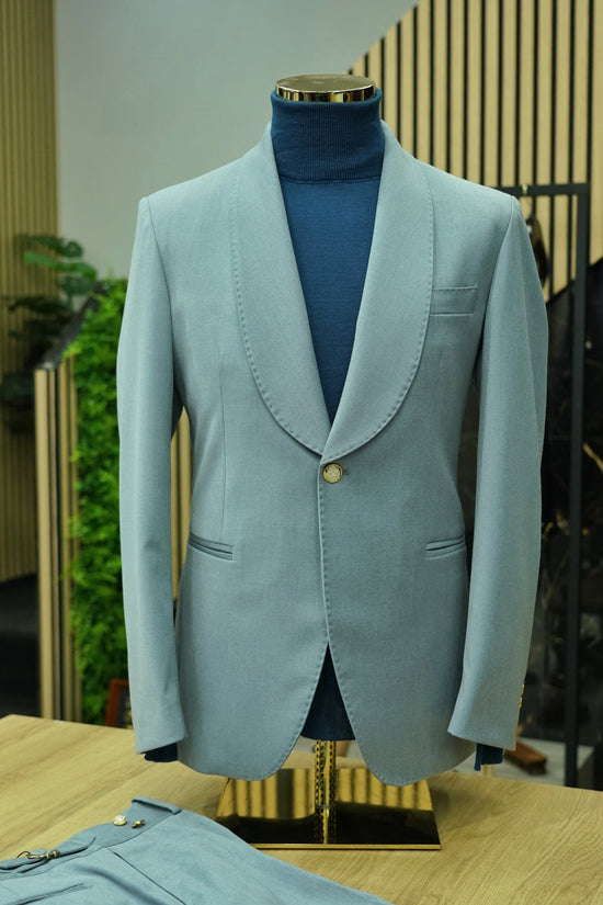 Abito harmonious collo a scialle azzurro polvere con bottoni oro