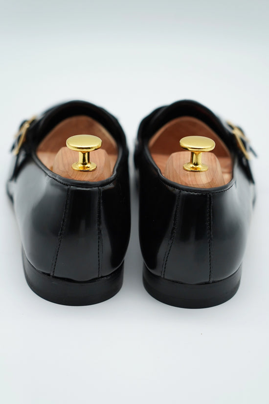 Mocassino doppiafibbia con frange abrasivato e camoscio nero