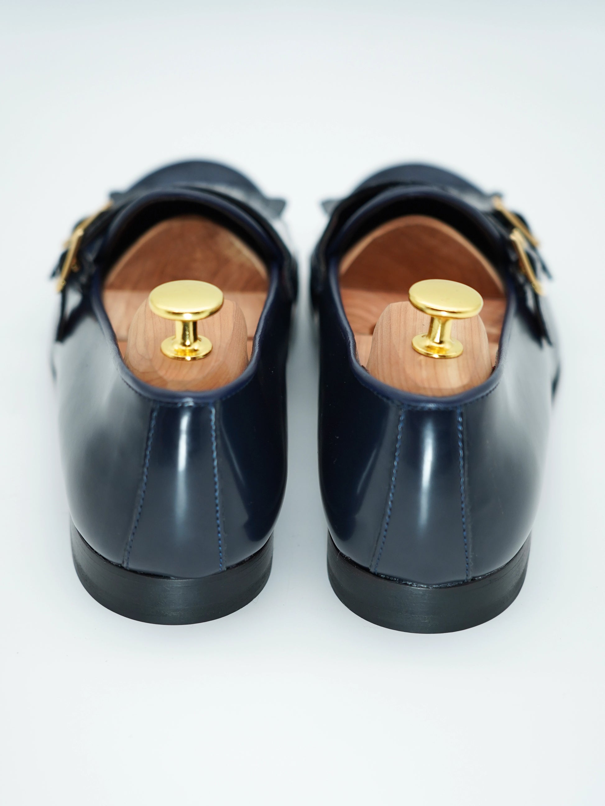 Mocassino doppiafibbia con frange abrasivato e camoscio blu