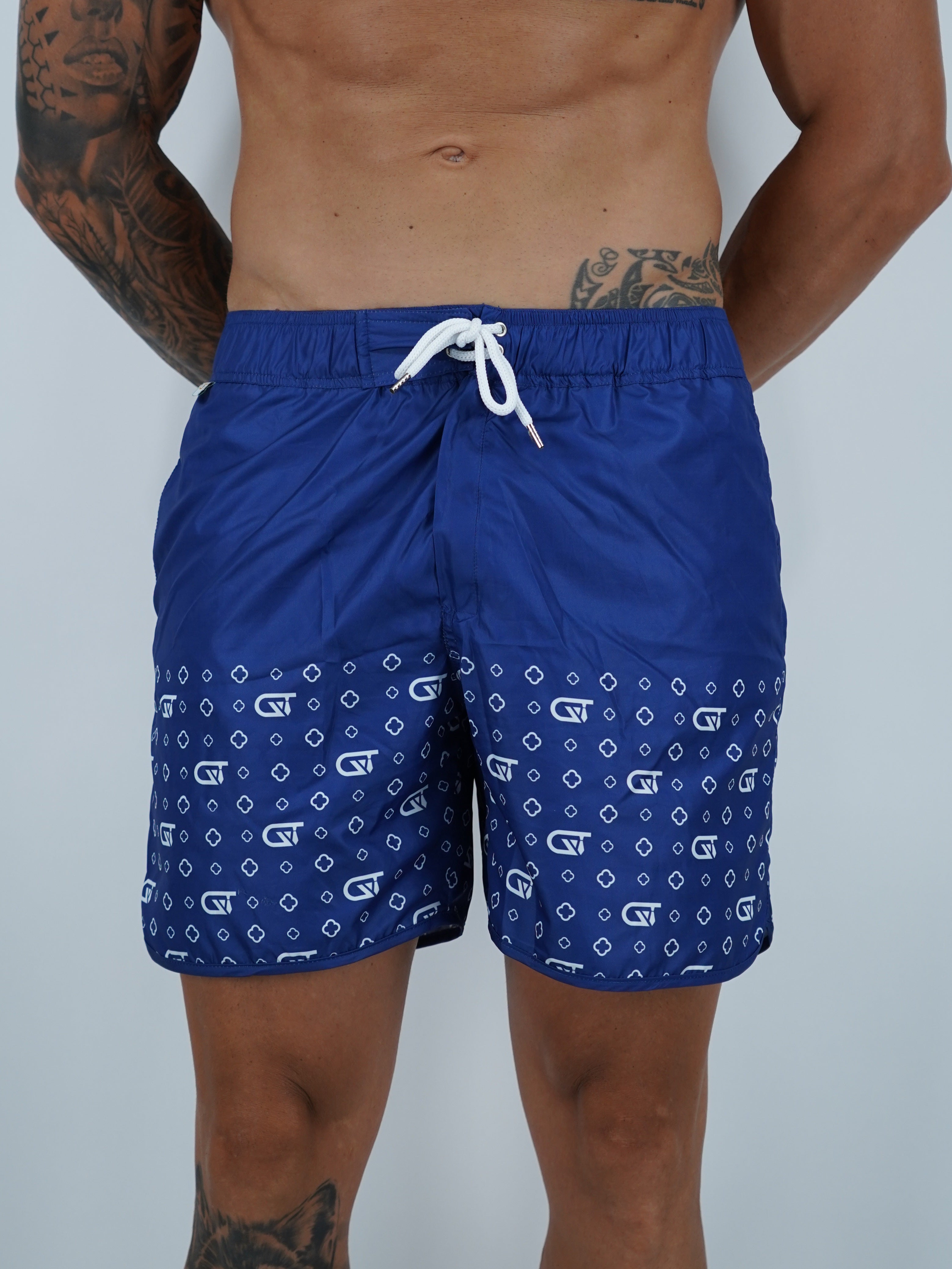 Shorts da mare monogram fondo blu stampa bianca, tessuto anti goccia idrorepellente