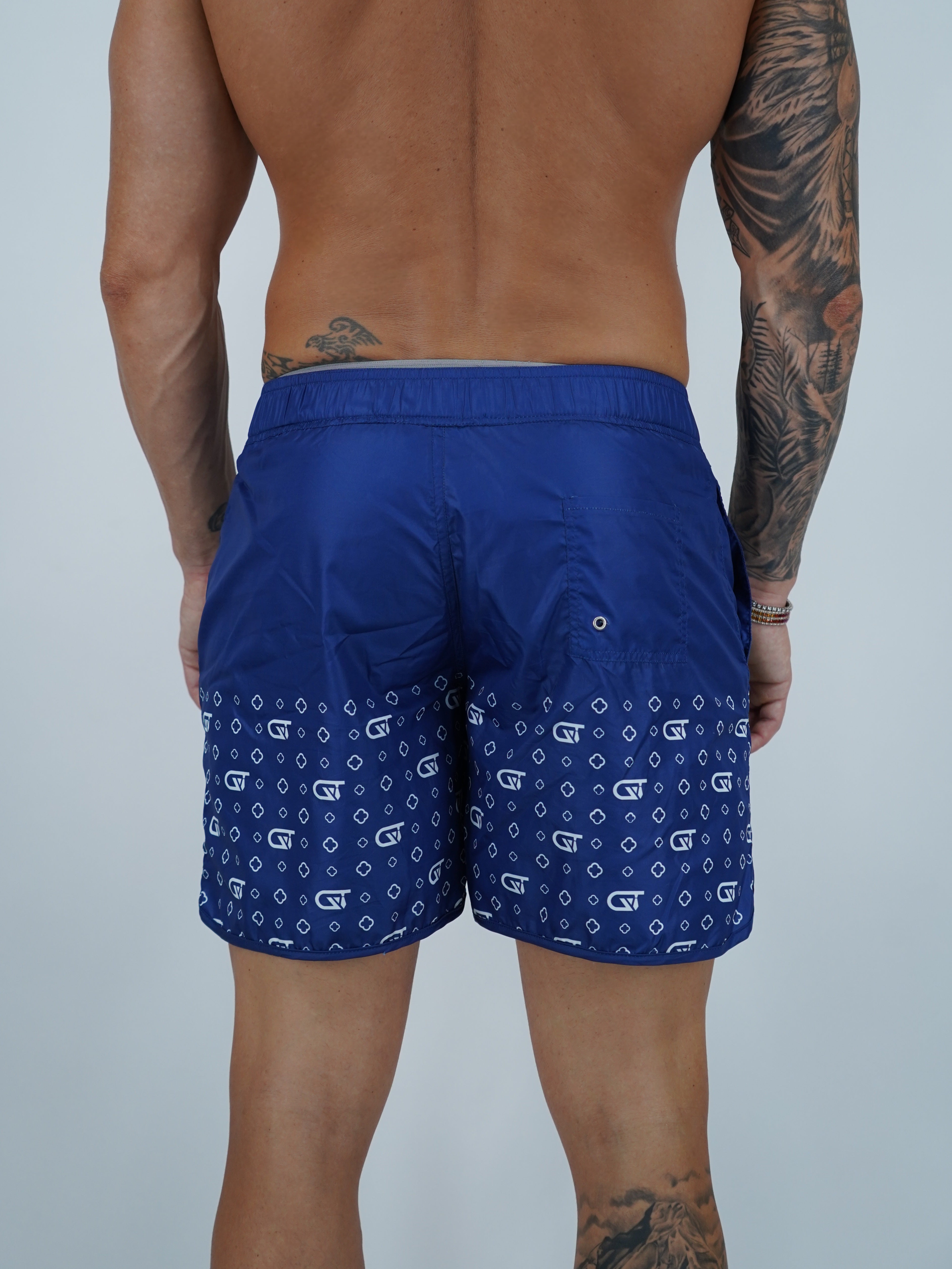 Shorts da mare monogram fondo blu stampa bianca, tessuto anti goccia idrorepellente