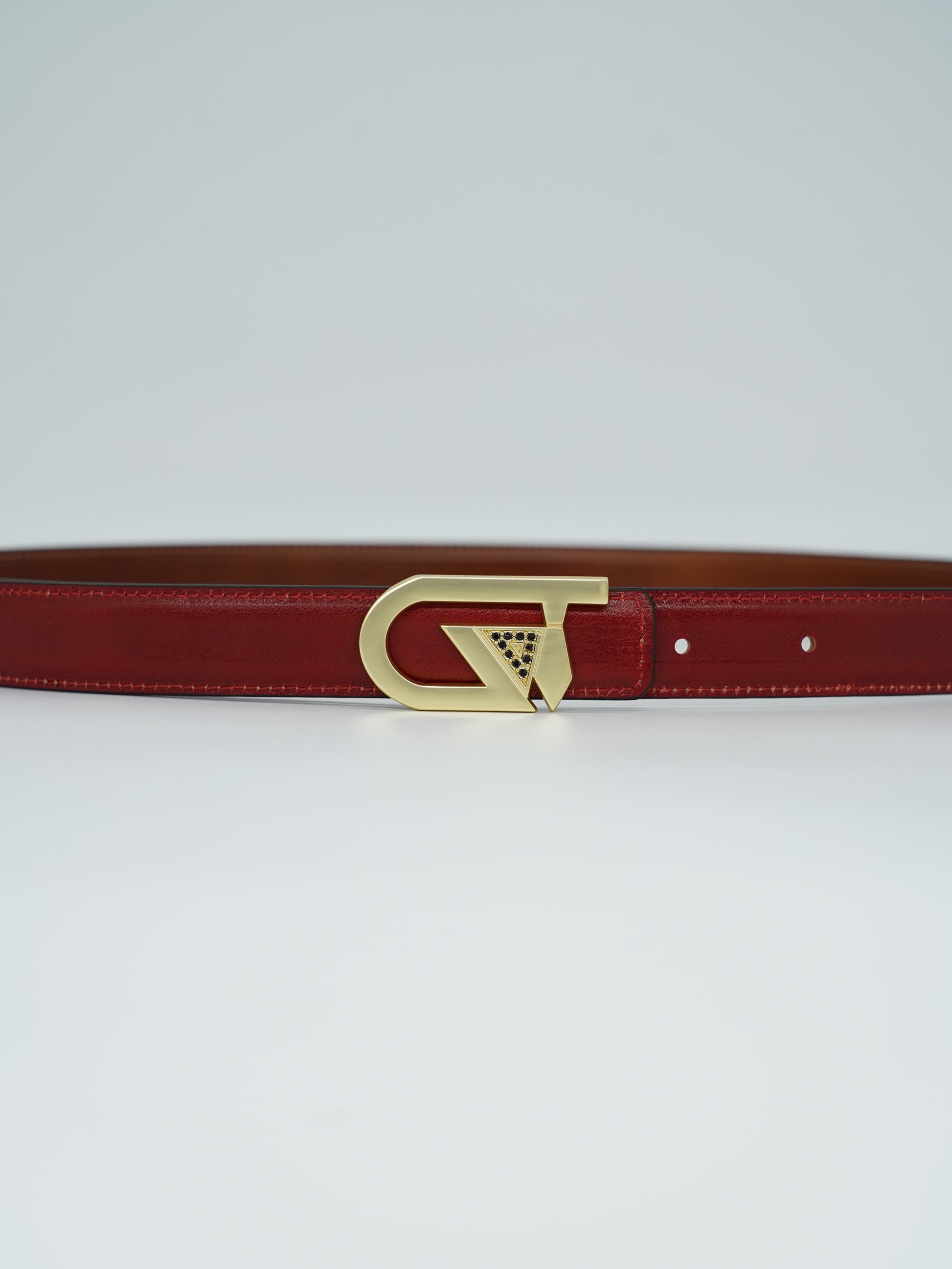 Cintura GT reversibile 2,5cm in pelle di vitello primo fiore tamponato a mano rosso Inglese/cuoio con fibbia oro satinato