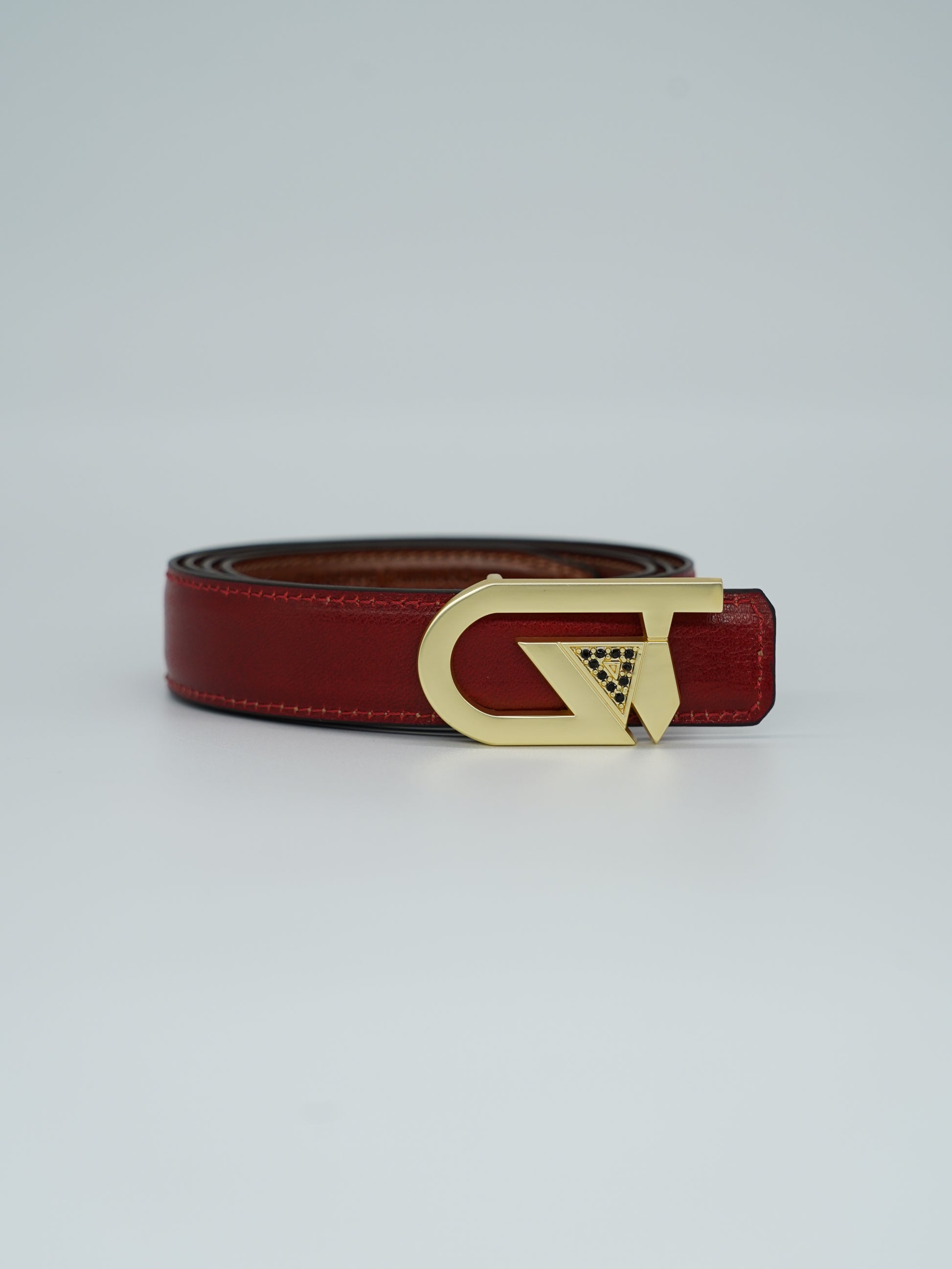 Cintura GT reversibile 2,5cm in pelle di vitello primo fiore tamponato a mano rosso Inglese/cuoio con fibbia oro satinato