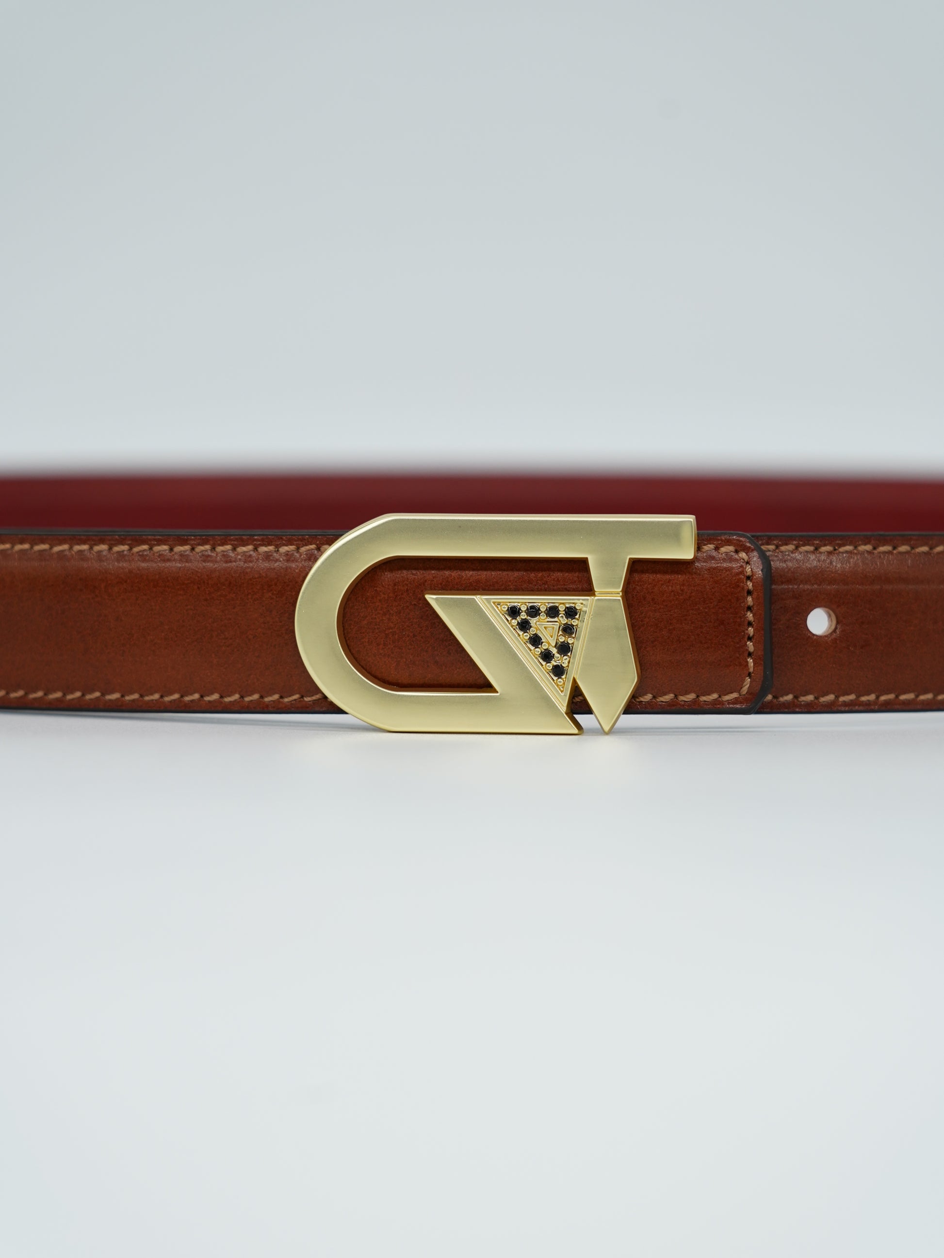 Cintura GT reversibile 2,5cm in pelle di vitello primo fiore tamponato a mano rosso Inglese/cuoio con fibbia oro satinato