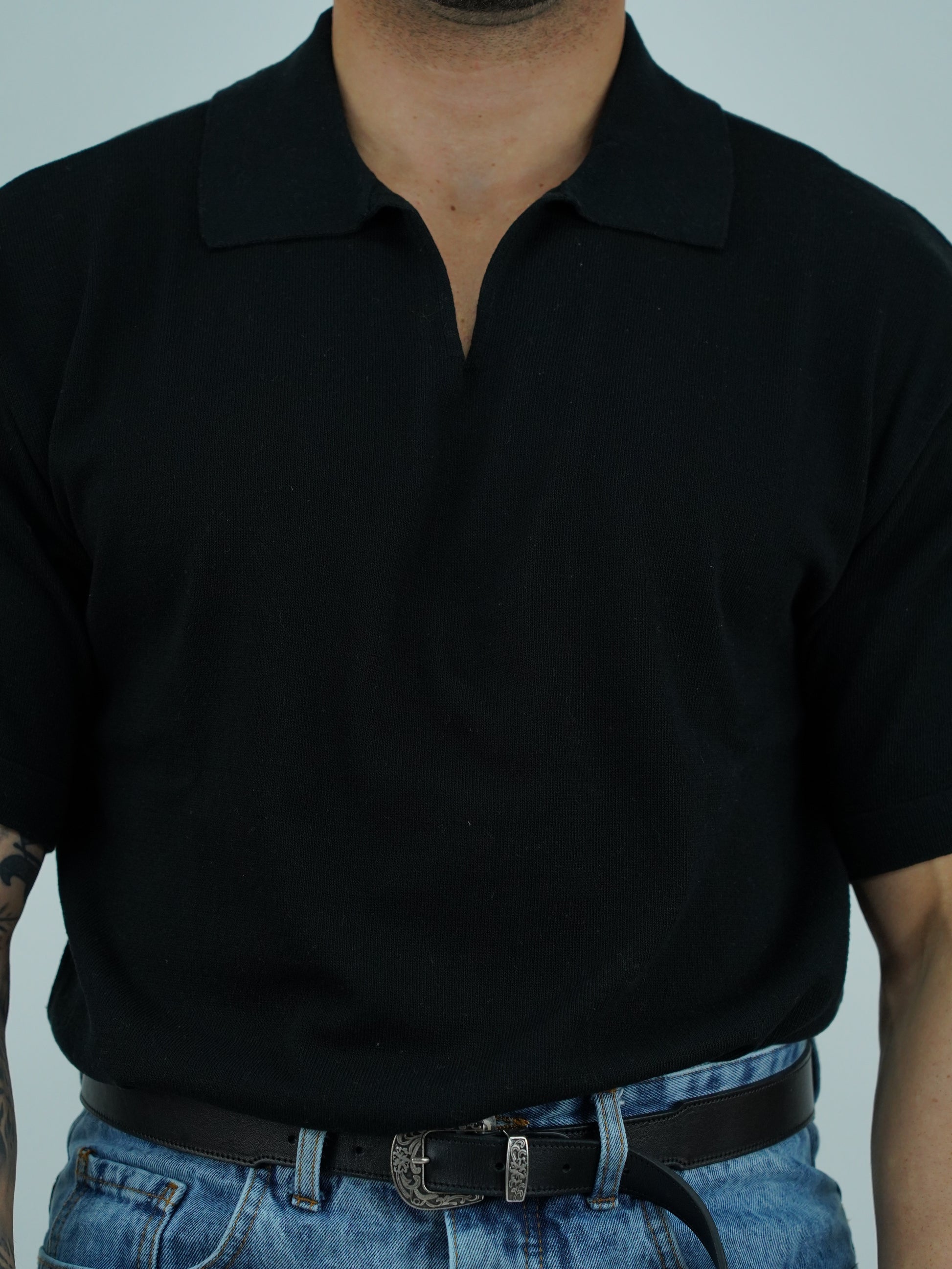 Polo smacchinata nera