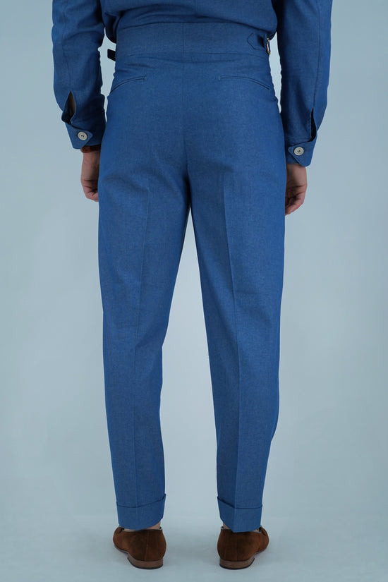Gurkha biforcato effetto jeans lavaggio chiaro con fibbie stringenti laterali