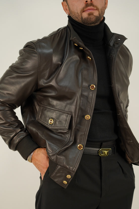 Giubbino in pelle testa di moro con bottoni oro