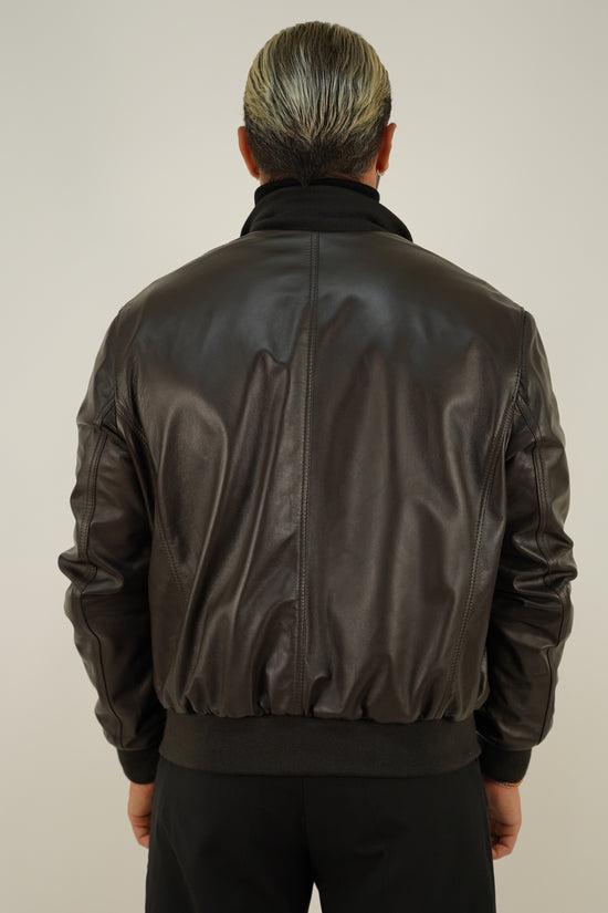 Giubbino in pelle testa di moro con bottoni oro