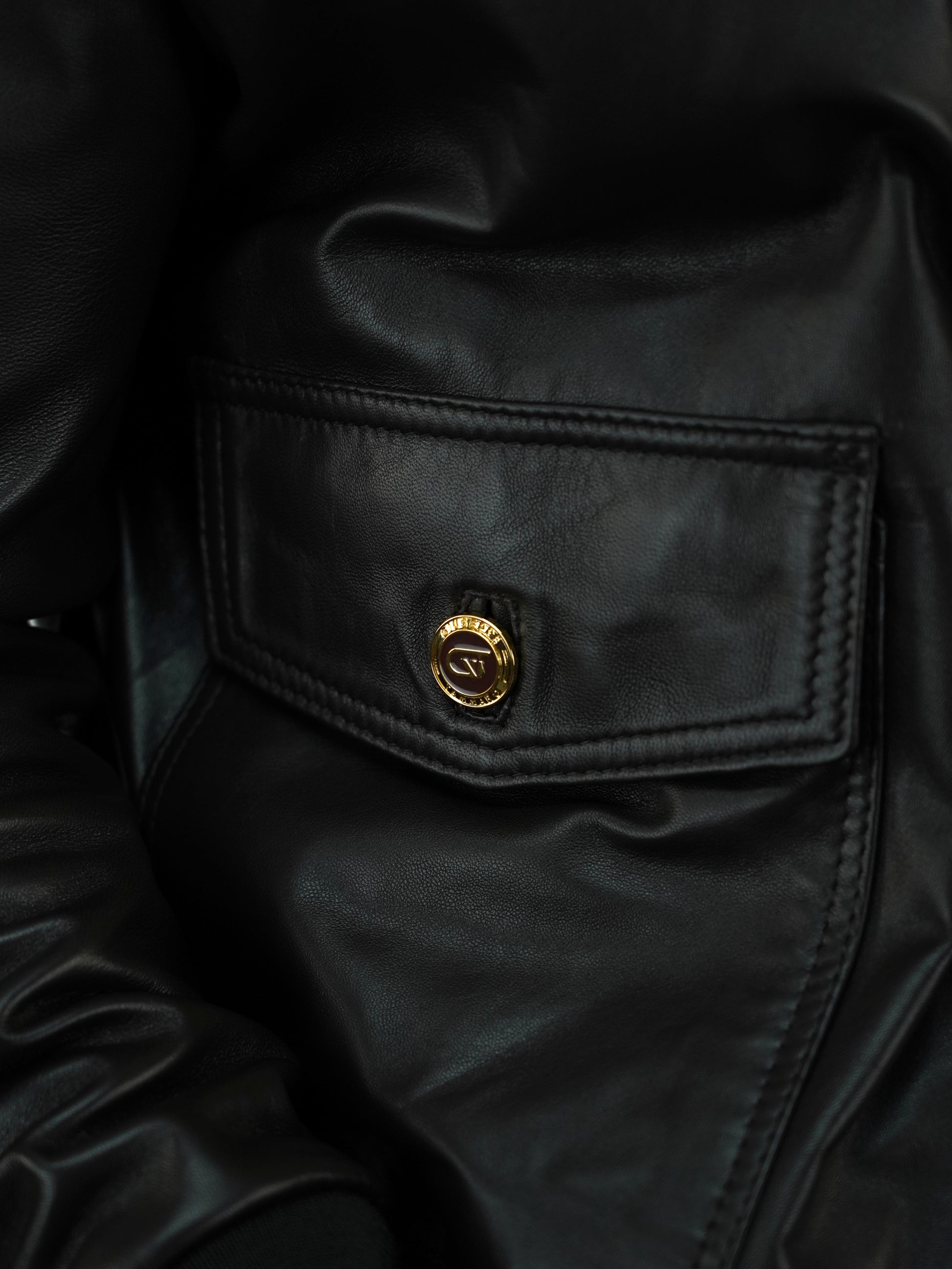 Giubbino in pelle testa di moro con bottoni oro