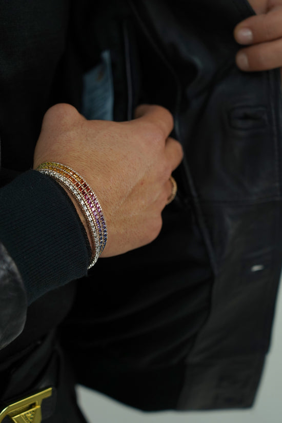 Giubbino in pelle nero con bottoni oro