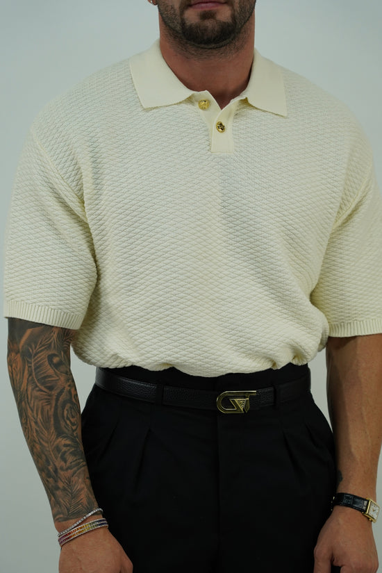 Polo in cotone smacchinato panna con bottoni oro