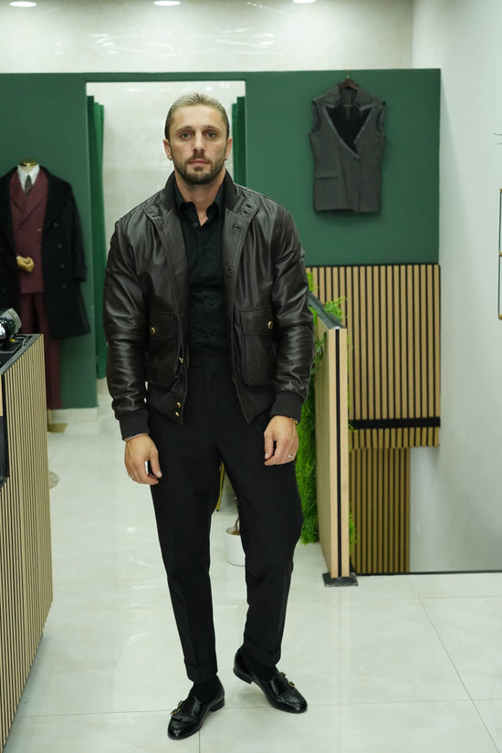 Giubbino in pelle testa di moro con bottoni oro