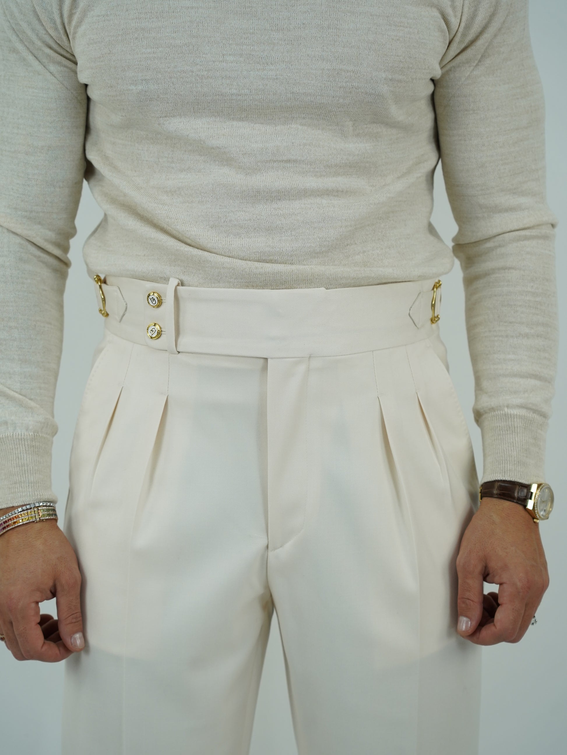 Gurkha panna con bottoni oro e fibbie stringenti laterali