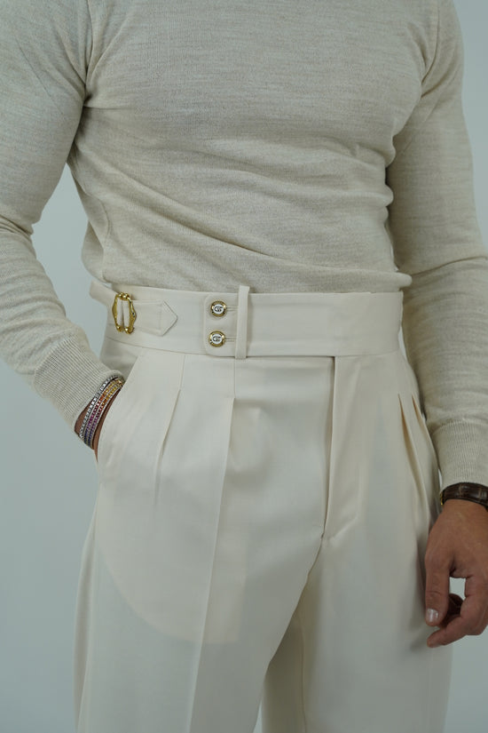 Gurkha panna con bottoni oro e fibbie stringenti laterali