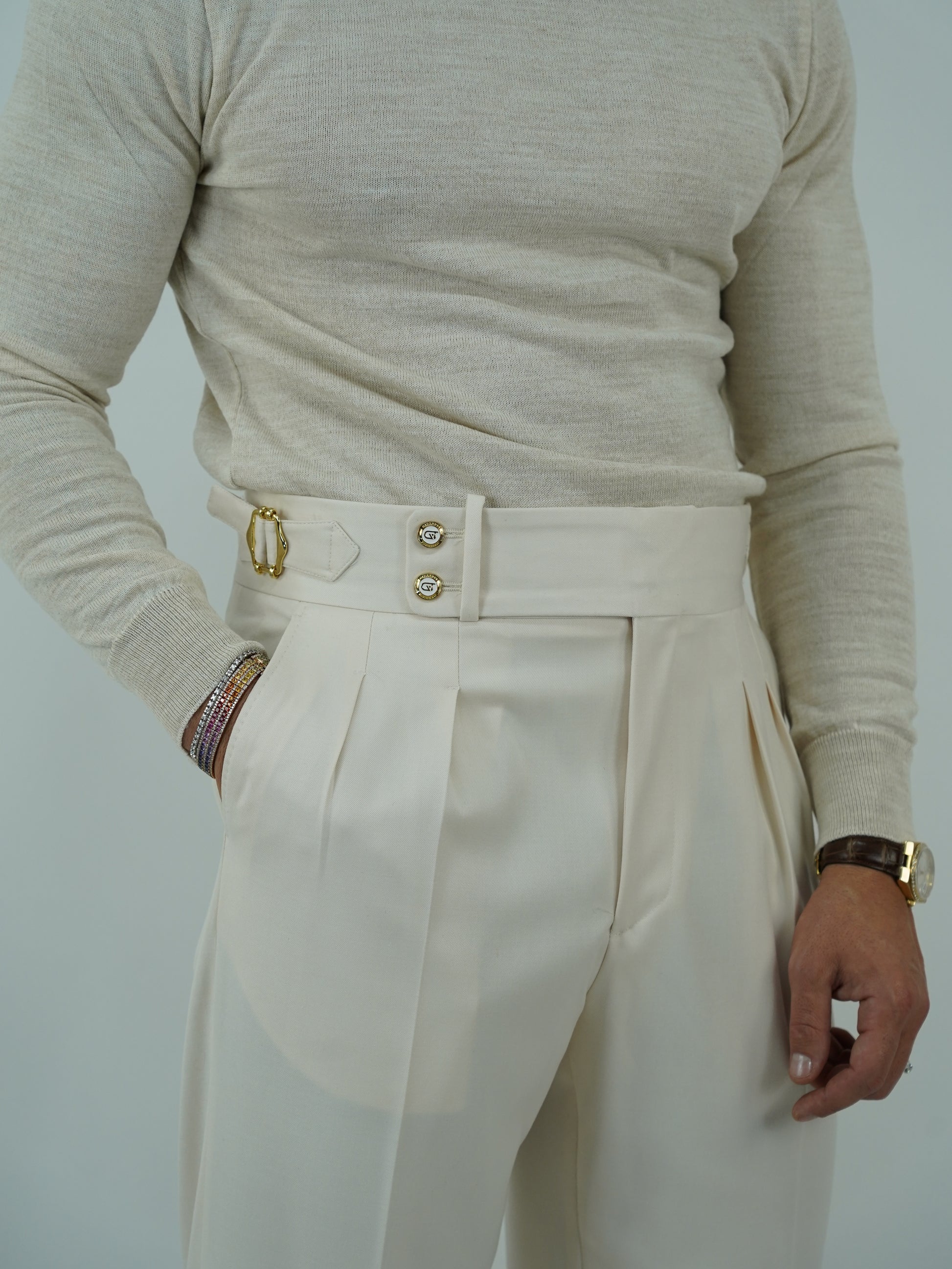 Gurkha panna con bottoni oro e fibbie stringenti laterali