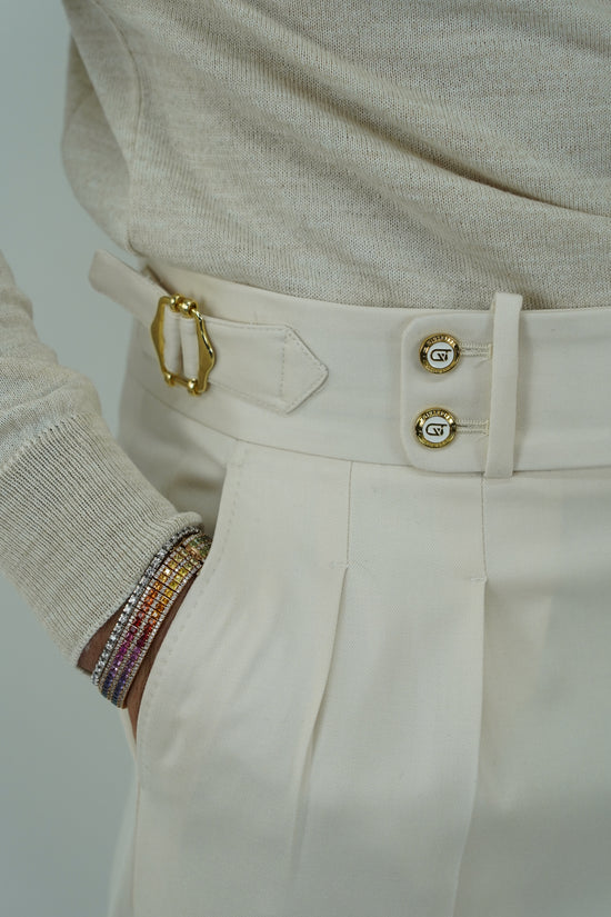 Gurkha panna con bottoni oro e fibbie stringenti laterali