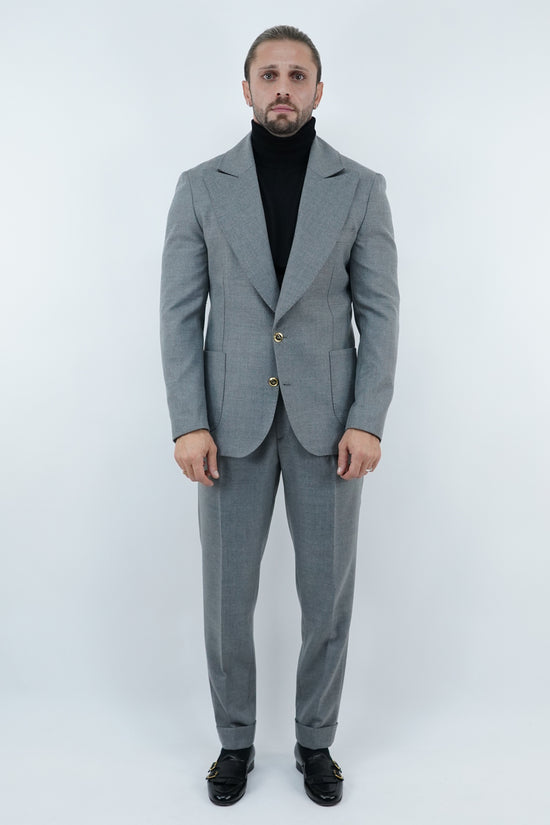 Abito extensive monopetto petto a lancia diagonale cenere con bottoni oro