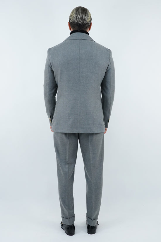 Abito extensive monopetto petto a lancia diagonale cenere con bottoni oro