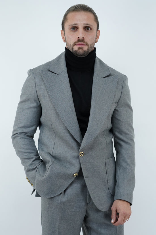 Abito extensive monopetto petto a lancia diagonale cenere con bottoni oro