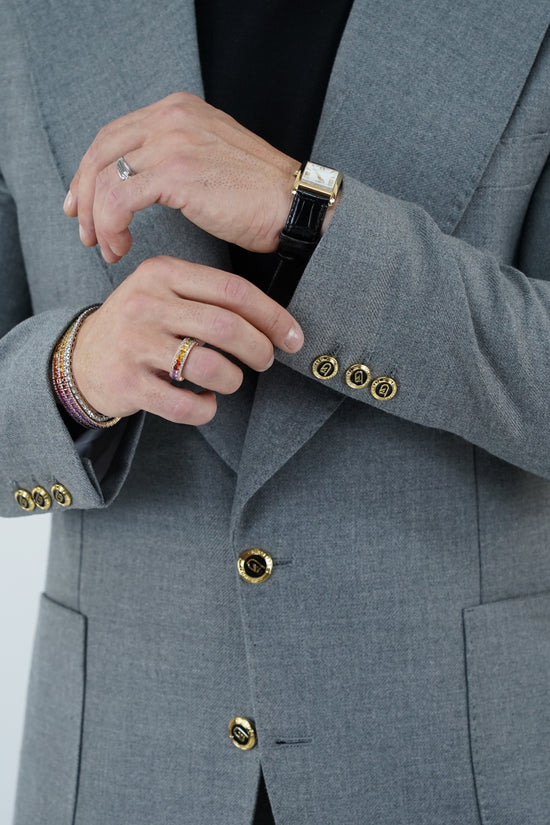 Abito extensive monopetto petto a lancia diagonale cenere con bottoni oro