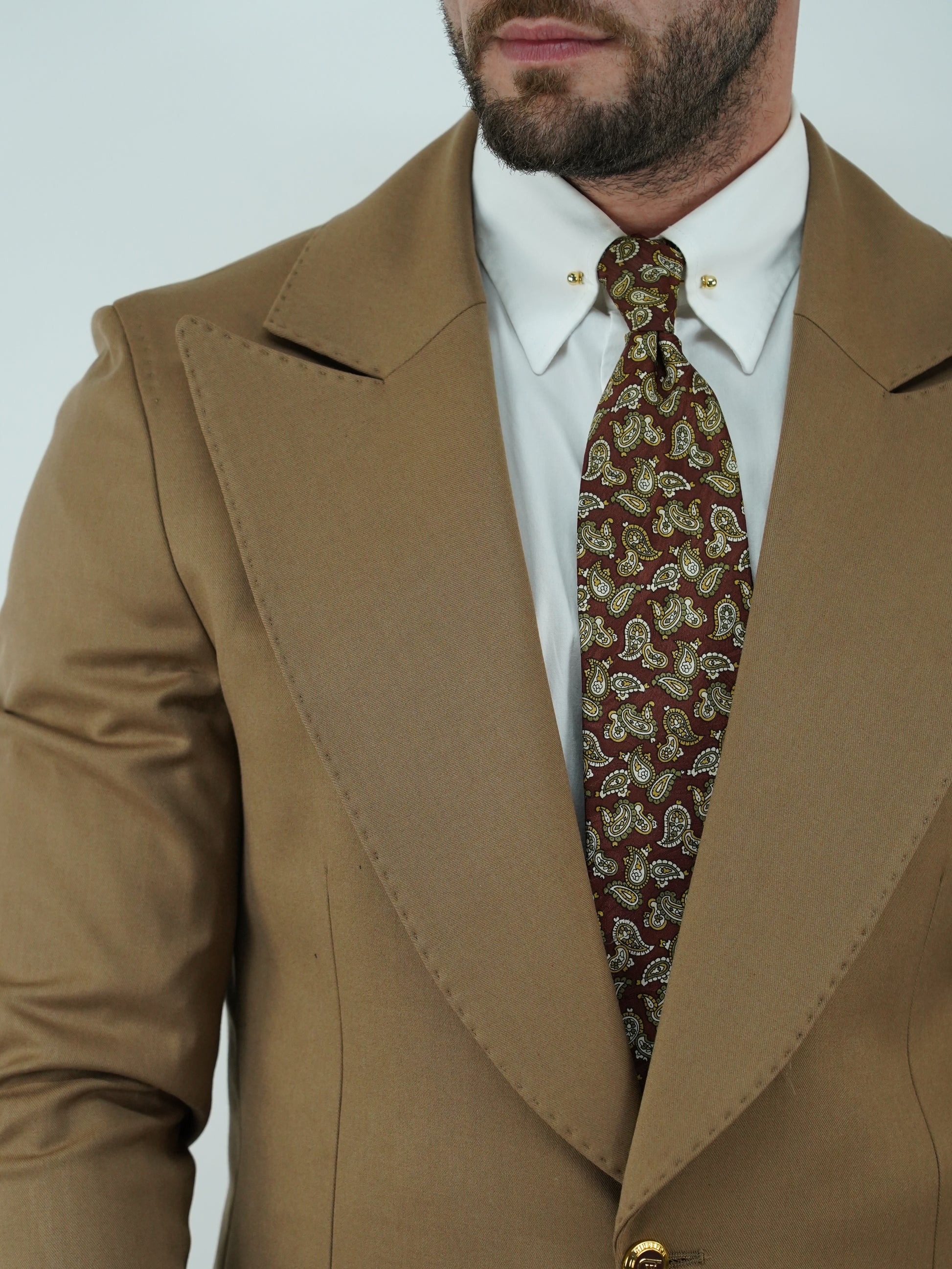 Abito extensive monopetto petto a lancia fango con bottoni oro