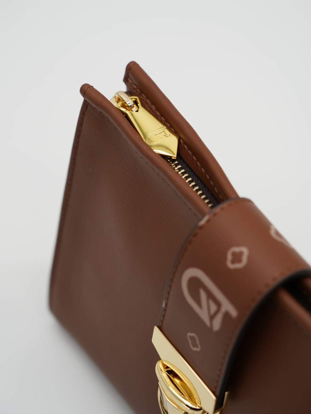 Pochette monogram cuoio