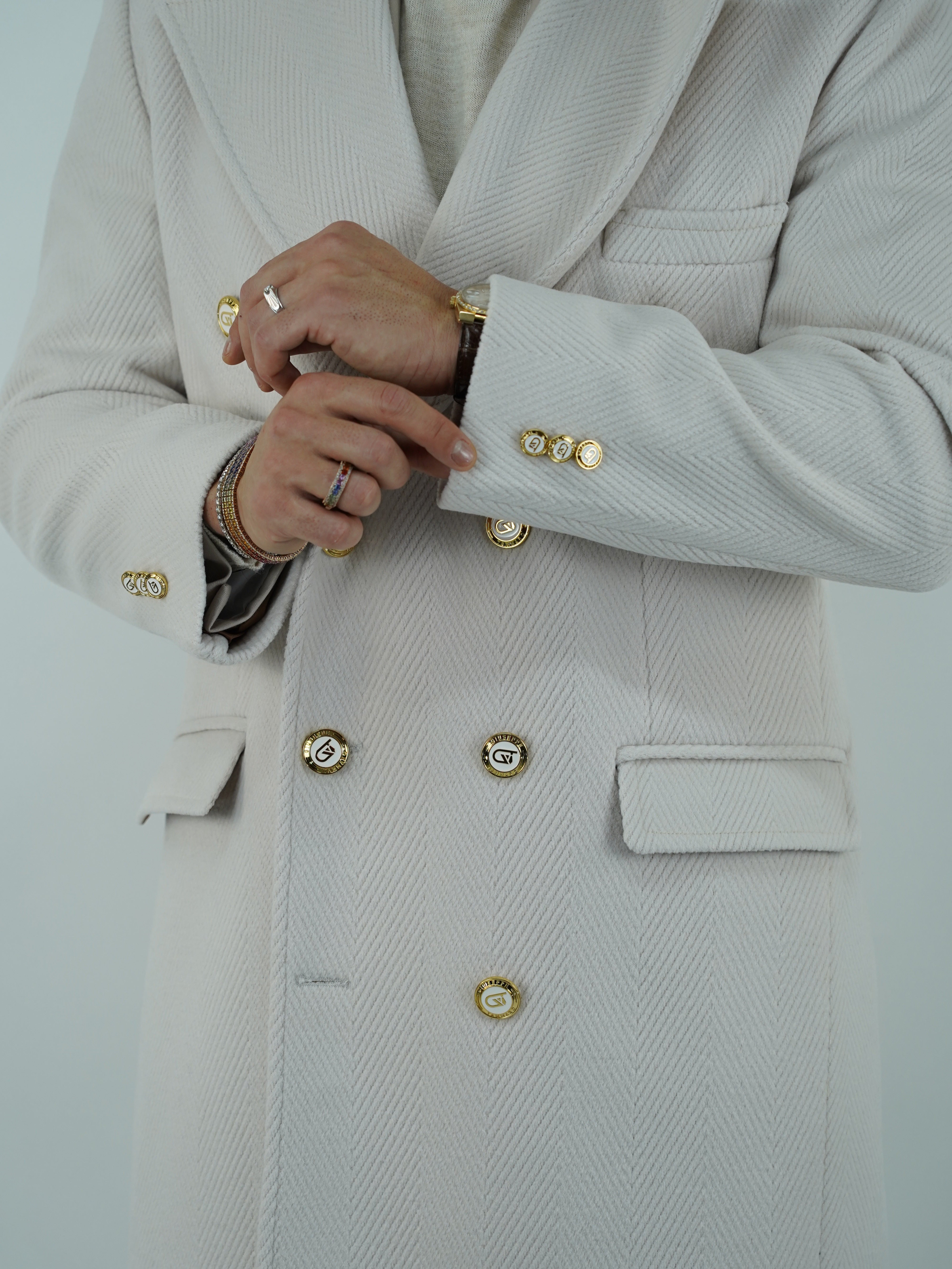 Cappotto Raglan Spigato Panna con bottoni oro