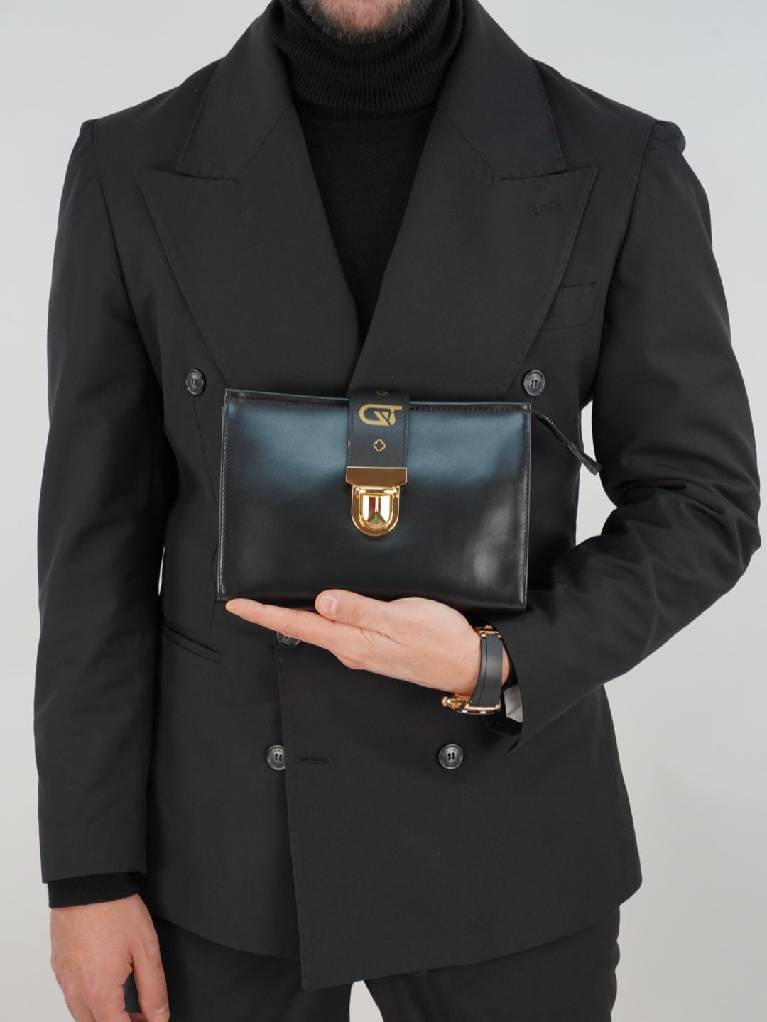 Pochette monogram nera