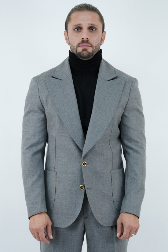 Abito extensive monopetto petto a lancia diagonale cenere con bottoni oro