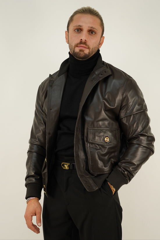 Giubbino in pelle testa di moro con bottoni oro