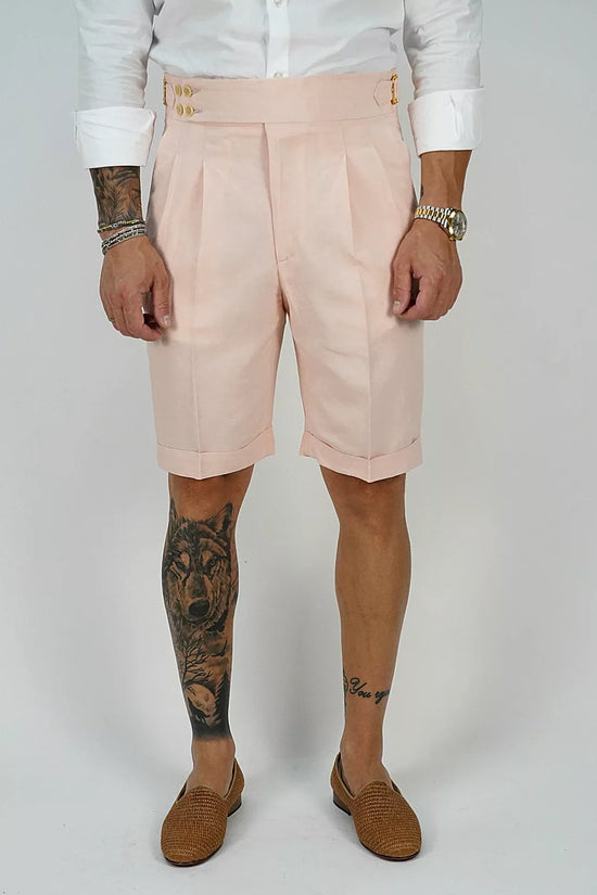 Bermuda in lino rosa con 4 bottoni e fibbie stringenti laterali