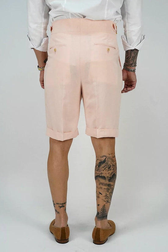 Bermuda in lino rosa con 4 bottoni e fibbie stringenti laterali