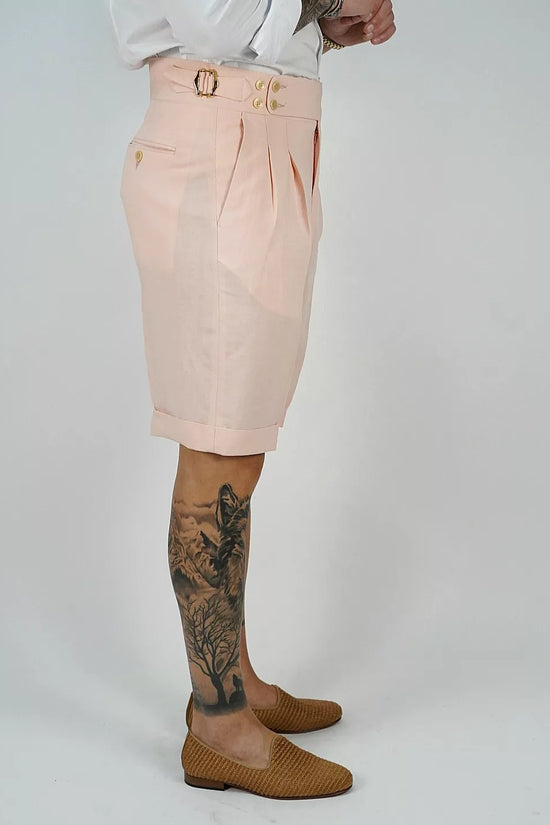 Bermuda in lino rosa con 4 bottoni e fibbie stringenti laterali