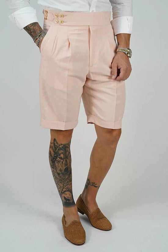 Bermuda in lino rosa con 4 bottoni e fibbie stringenti laterali
