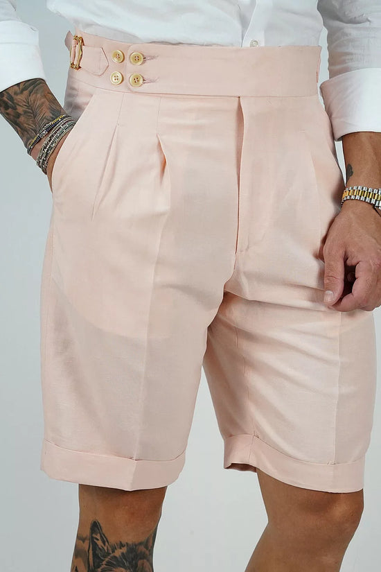 Bermuda in lino rosa con 4 bottoni e fibbie stringenti laterali