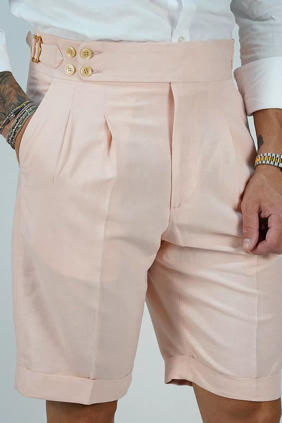 Bermuda in lino rosa con 4 bottoni e fibbie stringenti laterali