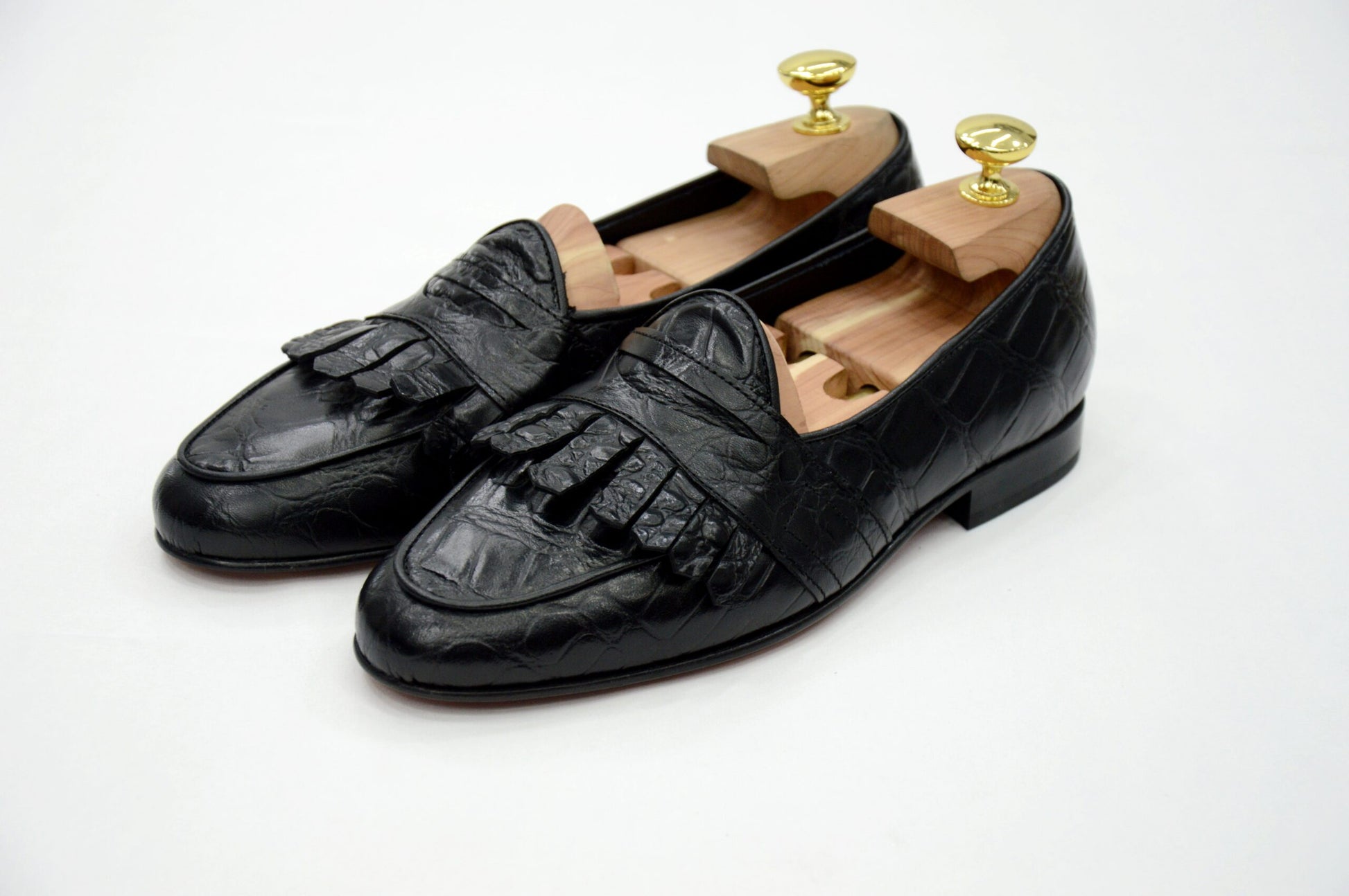 Mocassini con benda e frange cocco nero