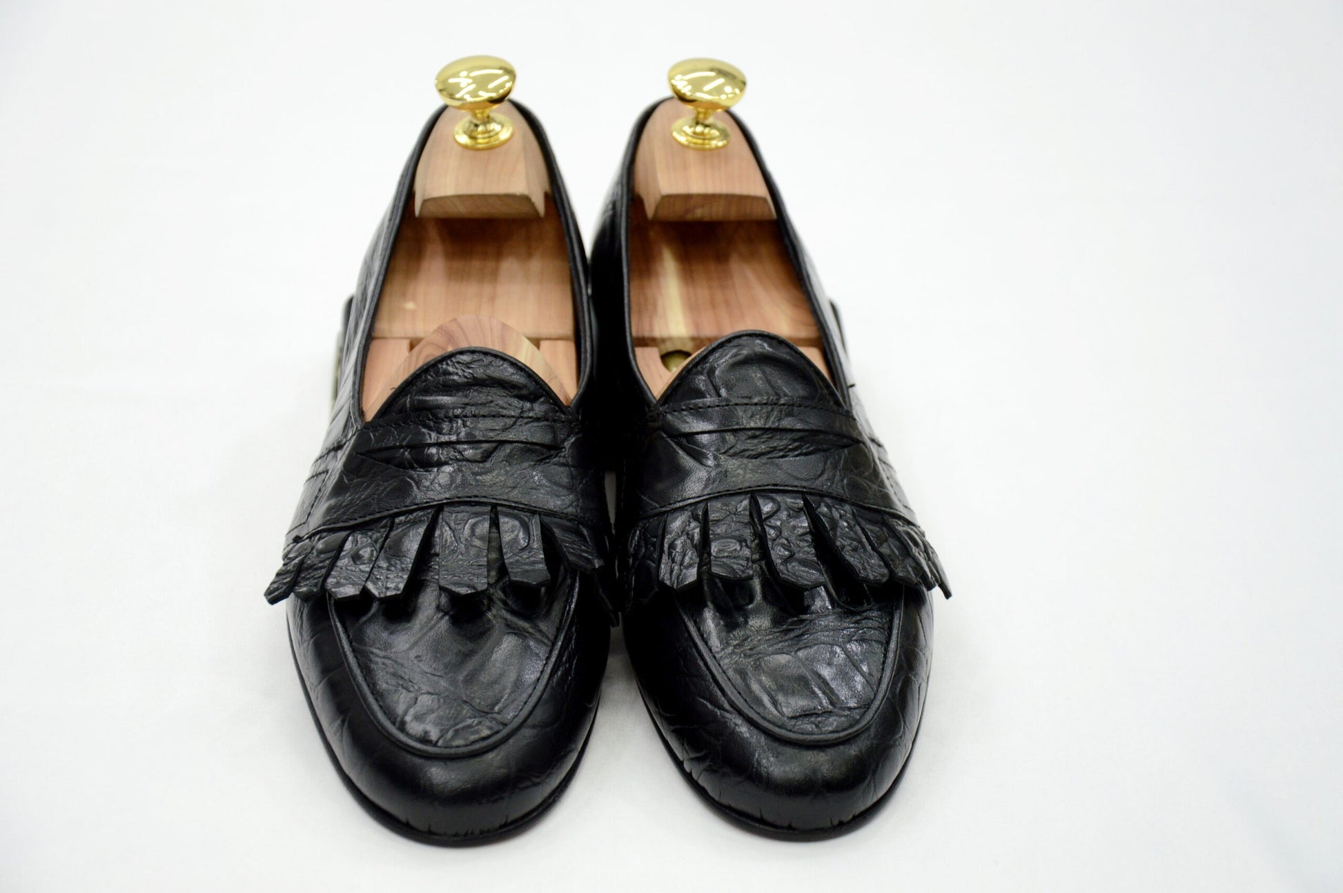 Mocassini con benda e frange cocco nero