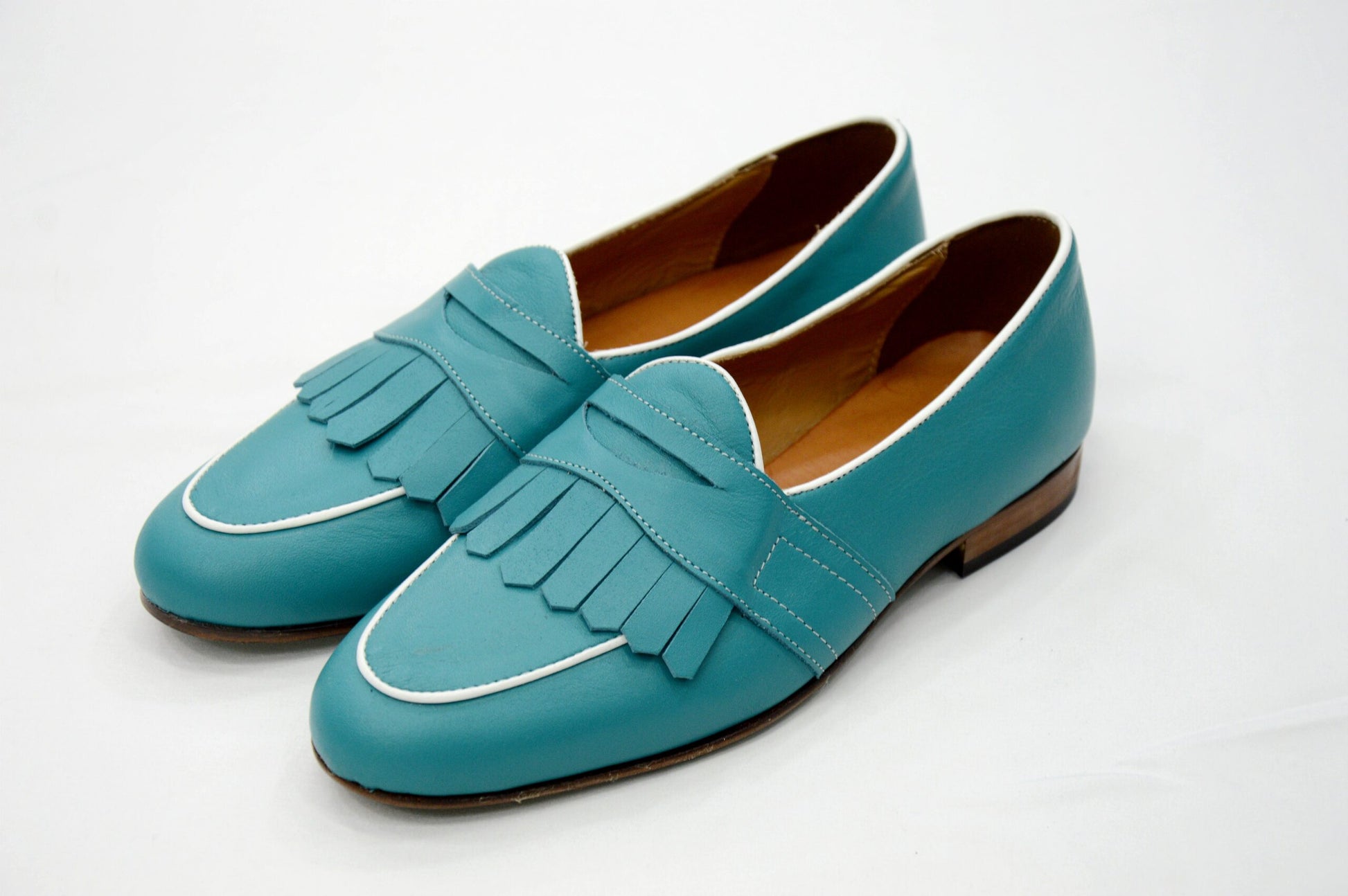 Mocassini con frange turchese
