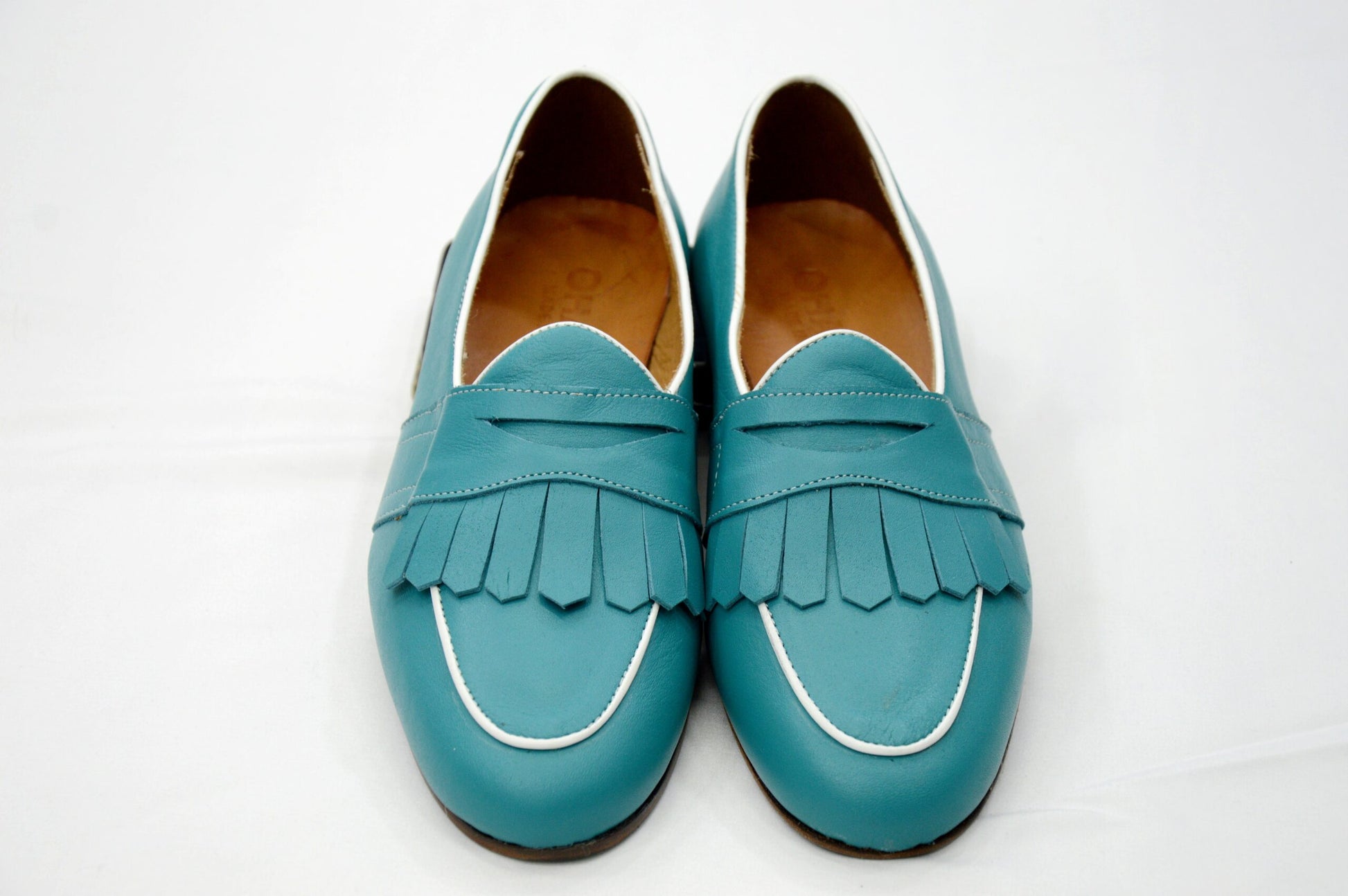 Mocassini con frange turchese